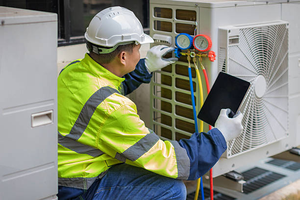 Professional Air Conditioning Repair technician working in Ellwood City, PA